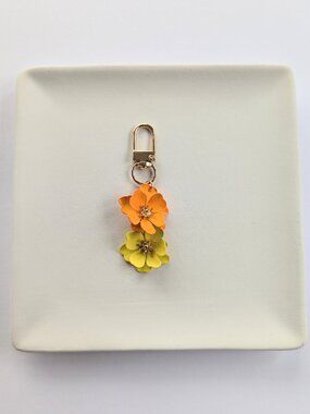 ORANGE YELLOW & GOLD FLOWER BAG CHARM